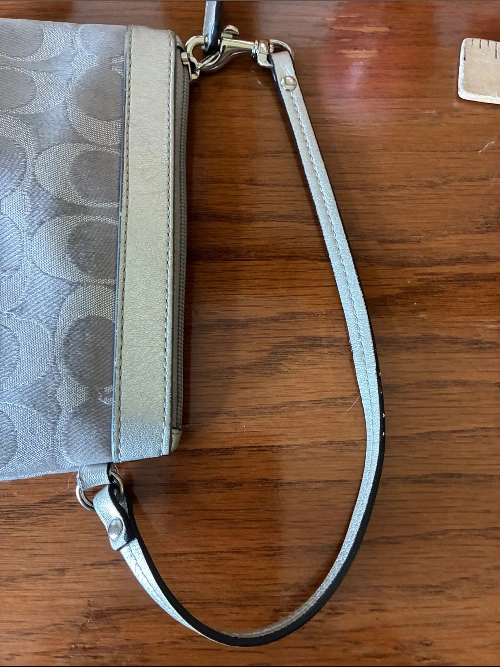 Coach Shimmer Signature Wristlet in   Silver Tone Metallic